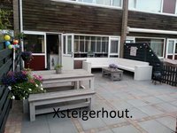 Steigerhout tuinmeubels in de achtertuin