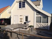 Steigerhout loungeset bij een vakantiehuisje